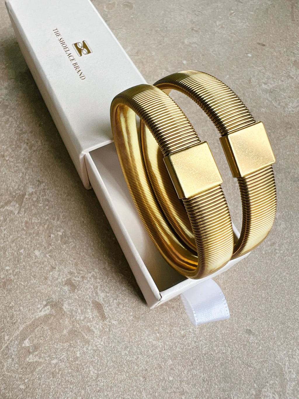 Shirt Sleeve Holder Gold
